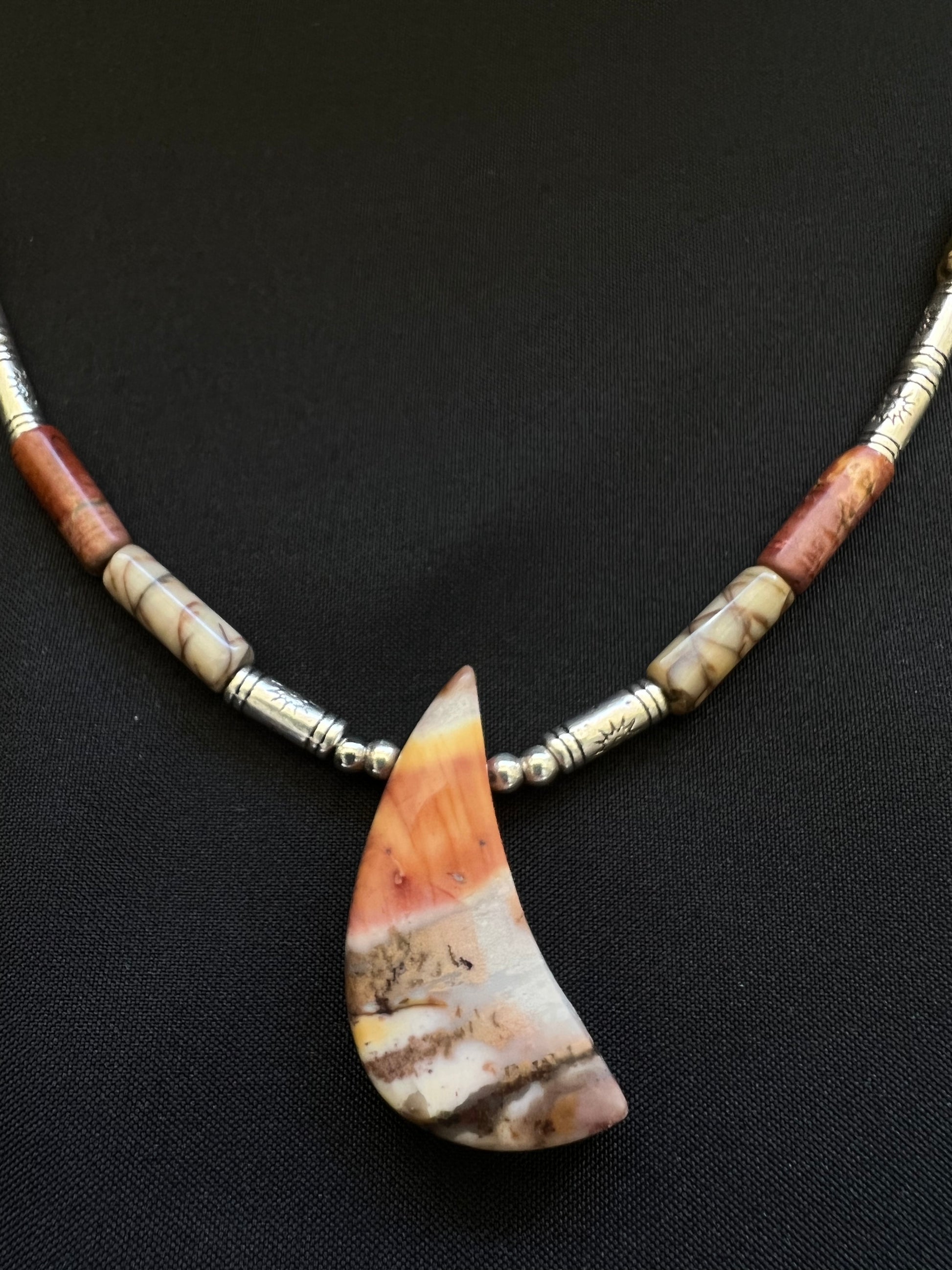 Necklace with red creek jasper half-moon shaped pendant, understated but powerful 21 inch necklace with silver sun-burst accents and magnetic clasp
