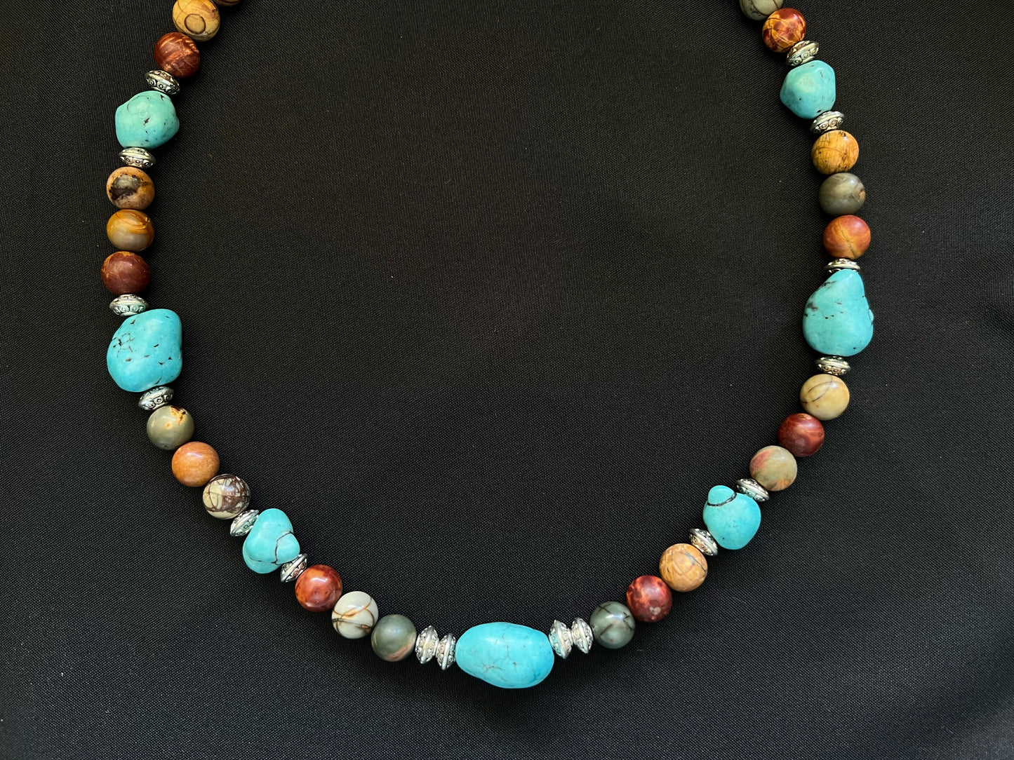 Genuine turquoise nugget and red creek jasper necklace 18 inches long with silver accents and toggle clasp