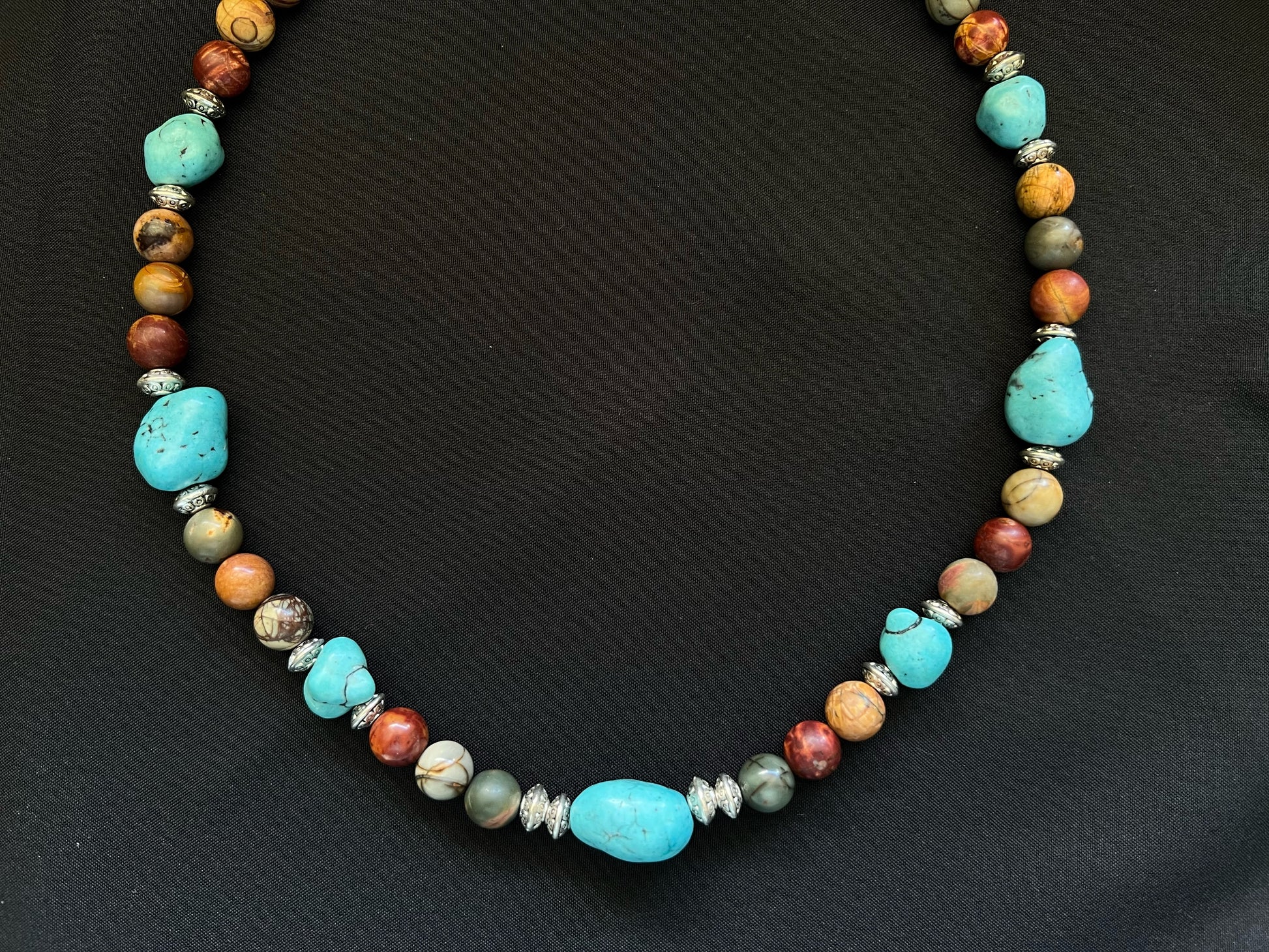 Genuine turquoise nugget and red creek jasper necklace 18 inches long with silver accents and toggle clasp
