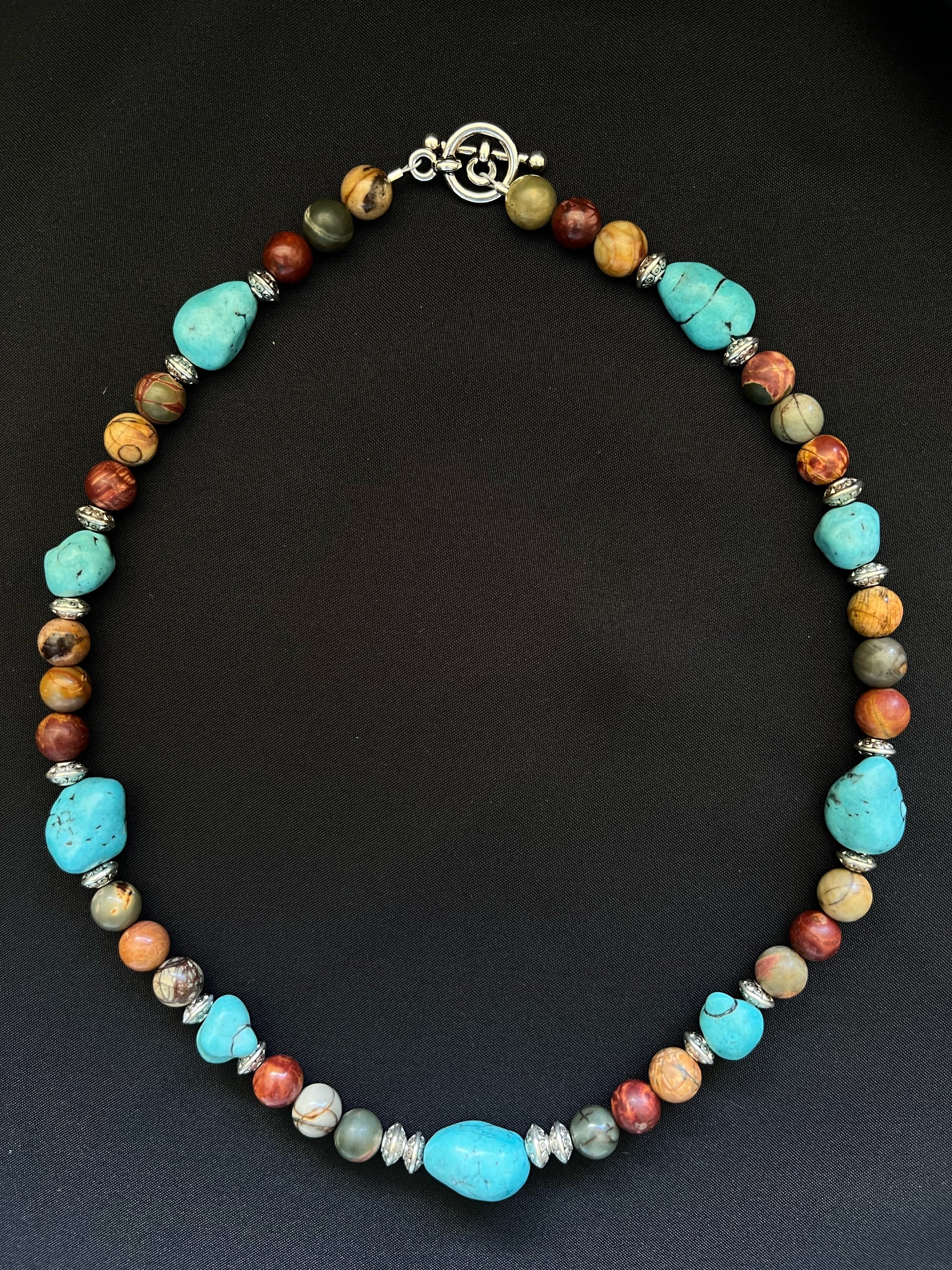Genuine turquoise nugget and red creek jasper necklace 18 inches long with silver accents and toggle clasp